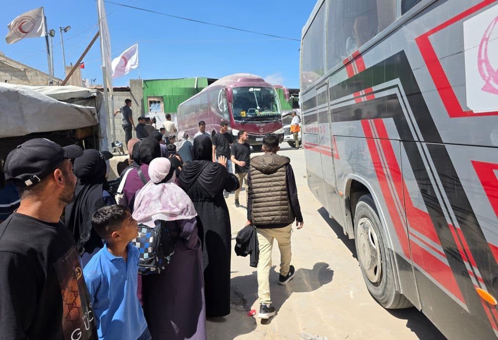 Palestinian patients accompanied by their relatives line up to depart Gaza for the Rafah crossing for treatment abroad, June 17, 2026. (Photo: Tariq Mohammad/APA Images)