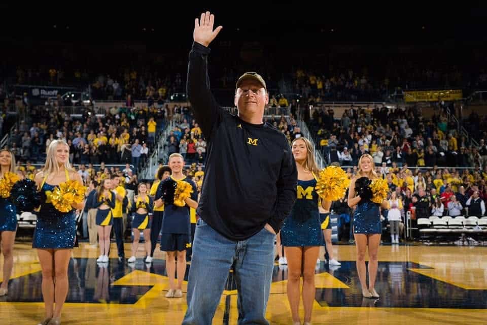 Detective Sergeant Ryan Cavanaugh of the University of Michigan Police Department being honored as “Veteran of the Game” in a Michigan basketball game, November 2019. Cavanaugh, who receives a salary of $103,334, is described in University reports as a “Master Trainer in Threat Assessment and Management,” a certificate given by the Department of Homeland Security. He served in the US Army for 23 years, including in Egypt, Guatemala, El Salvador, and Cuba. (Photo: University of Michigan Division of Public Safety & Security)