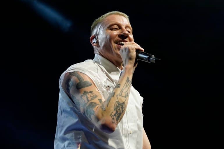 U.S. Rapper Macklemore performs on stage at OVO ARENA Wembley on April 12, 2023 in London, England (Photo by Liv Hema)