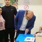 Former MK Sami Abu Shehadeh casting his ballot at a polling station during the 2022 Israeli general election, Jaffa, November 1, 2022. (Photo: Saeed Qaq/APA Images)
