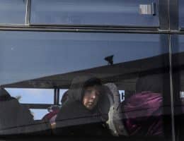 A Palestinian child looks out the window of a bus crossing into Egypt from the Gaza Strip through the Rafah border crossing, on February 6, 2024. (Photo: © Abed Rahim Khatib/DPA via ZUMA Press/APA Images)