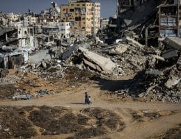 Temporary tents sheltering displaced Palestinians stand beside destroyed buildings in Gaza City on October 7, 2026, on the third anniversary of the outbreak of the war. (Photo: Bilal Osama/APA Images)