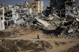 Temporary tents sheltering displaced Palestinians stand beside destroyed buildings in Gaza City on October 7, 2026, on the third anniversary of the outbreak of the war. (Photo: Bilal Osama/APA Images)