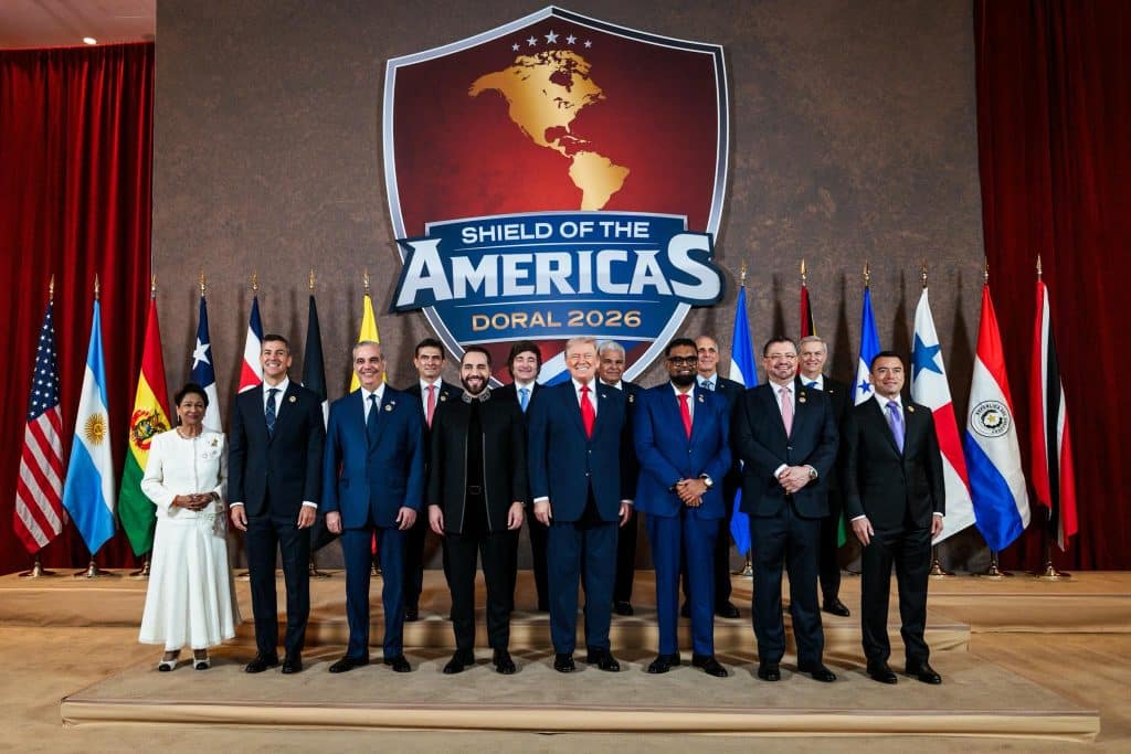 Donald Trump poses with world leaders at the Shield of the Americas summit on March 7, 2026, in Miami, Florida. First row (from left to right): Kamla Persad-Bissessar (Prime Minister of Trinidad and Tobago), Santiago Peña (President of Paraguay), Luis Abinader (President of the Dominican Republic), Nayib Bukele (President of El Salvador), Donald Trump (President of the United States), Irfaan Ali (President of Guyana), Rodrigo Chaves Robles (President of Costa Rica), Daniel Noboa (President of Ecuador).
Second row (from left to right): Rodrigo Paz (President of Bolivia), Javier Milei (President of Argentina), José Raúl Mulino (President of Panama), Nasry Asfura (President of Honduras), José Antonio Kast (President-elect of Chile). (Official White House Photo by Daniel Torok)